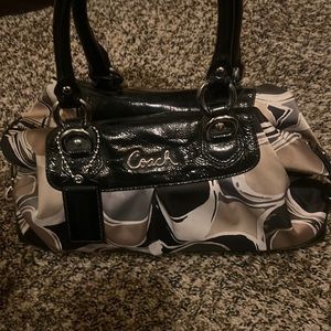 Used only couple times small coach purse pretty much brand new condition!